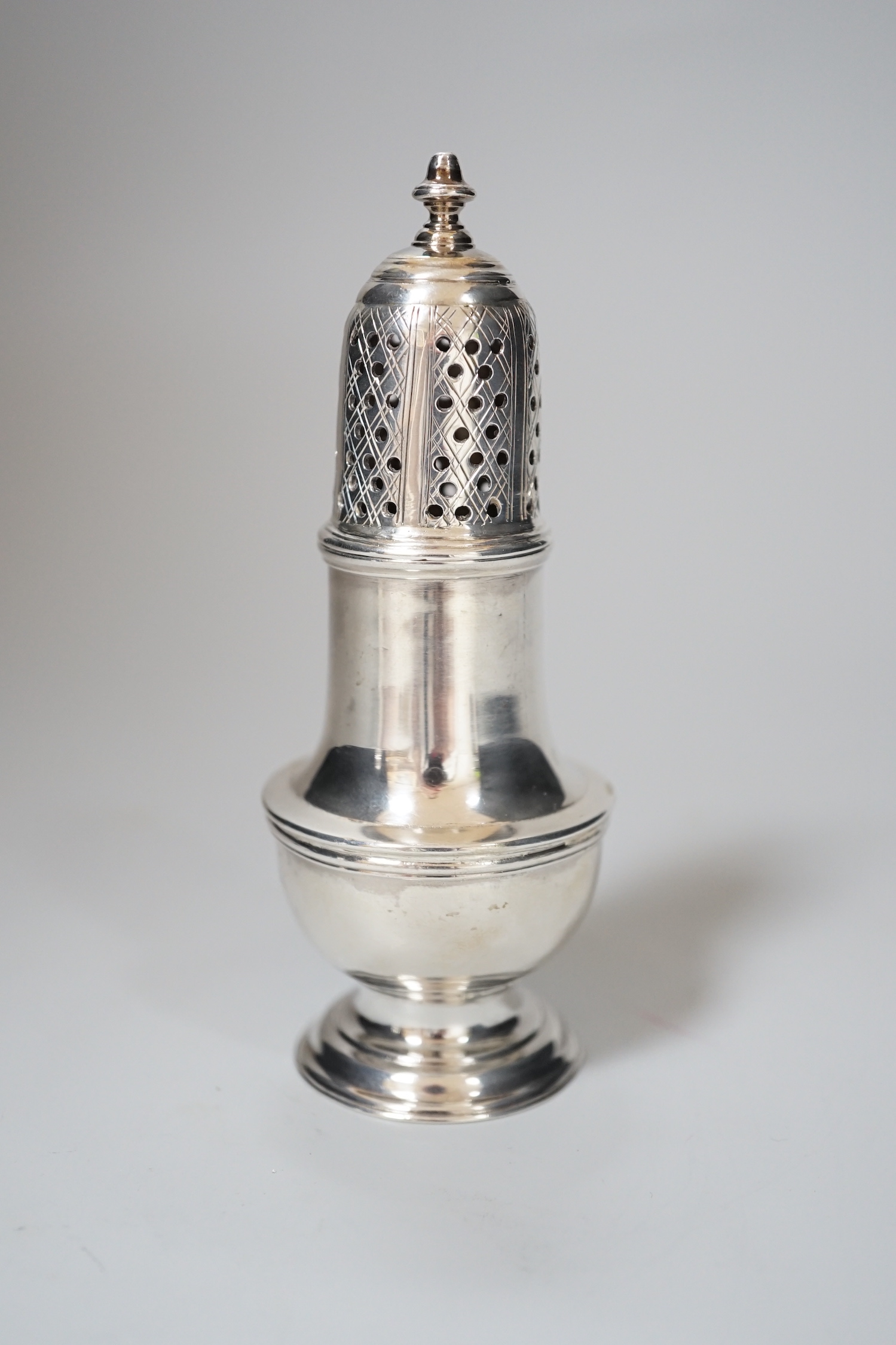 A George II silver baluster caster, makers mark obscured, London 1758, 11cm, 81 grams